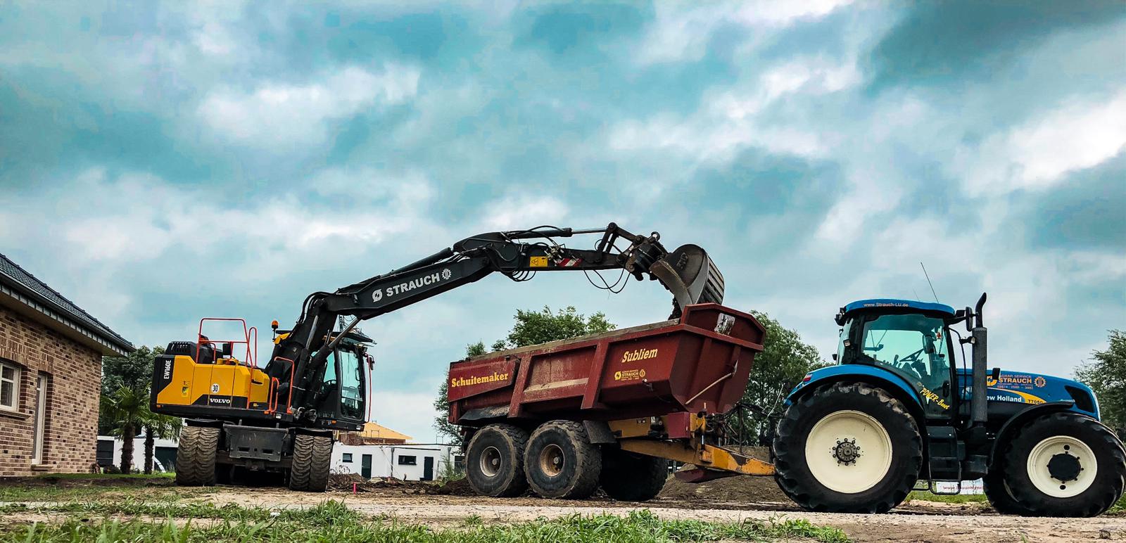 Volvo Mobilbagger EW160E und New Holland T7050 mit Schuitemaker Subliem 220S